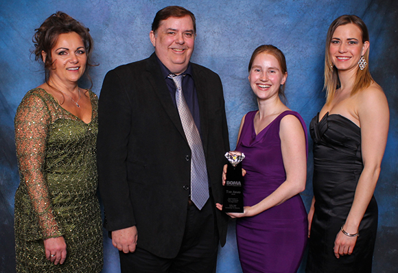 Members of the Office of Sustainability accept the BOMA award