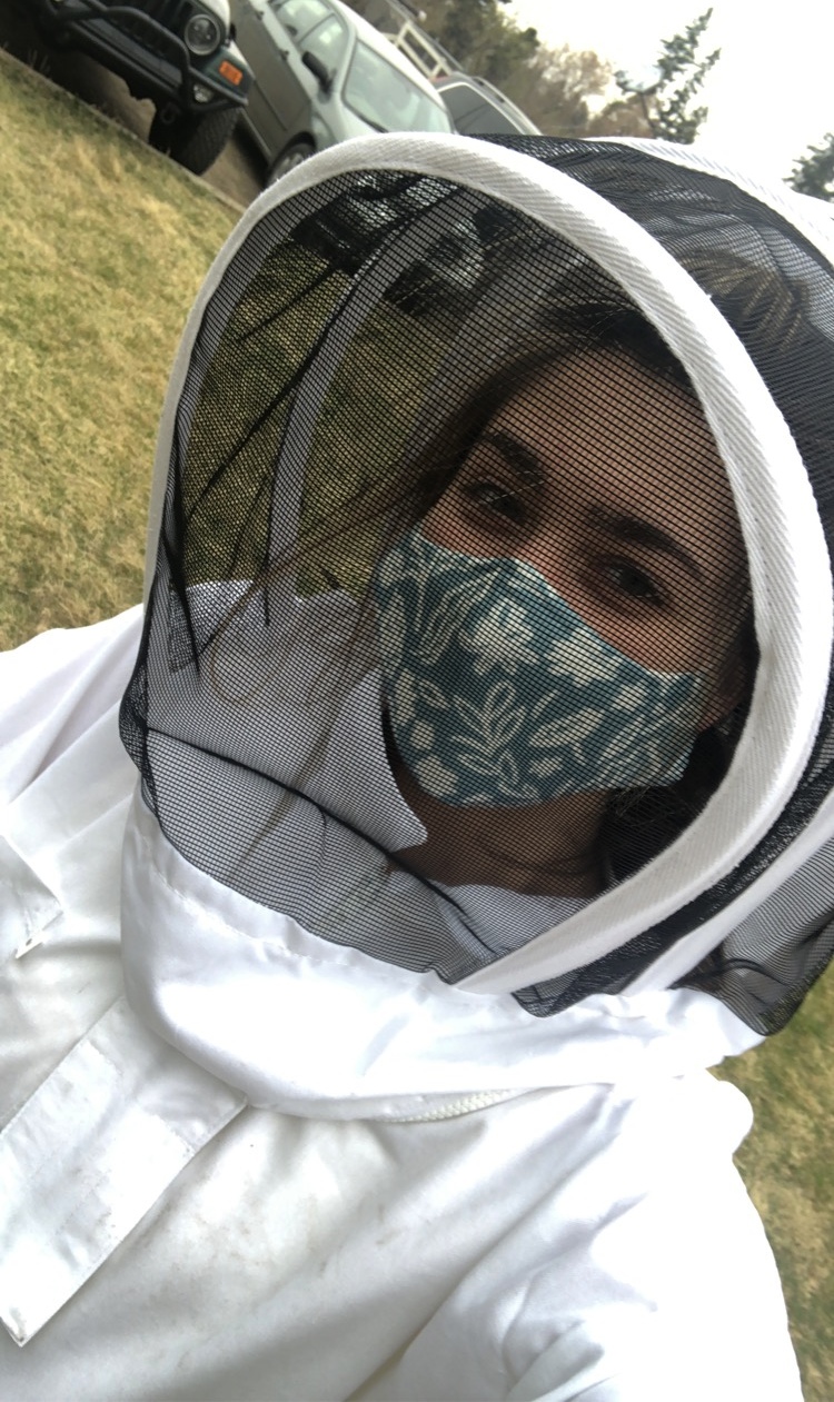 I-STEAM intern Tianna Tanasichuk in beekeeping garb