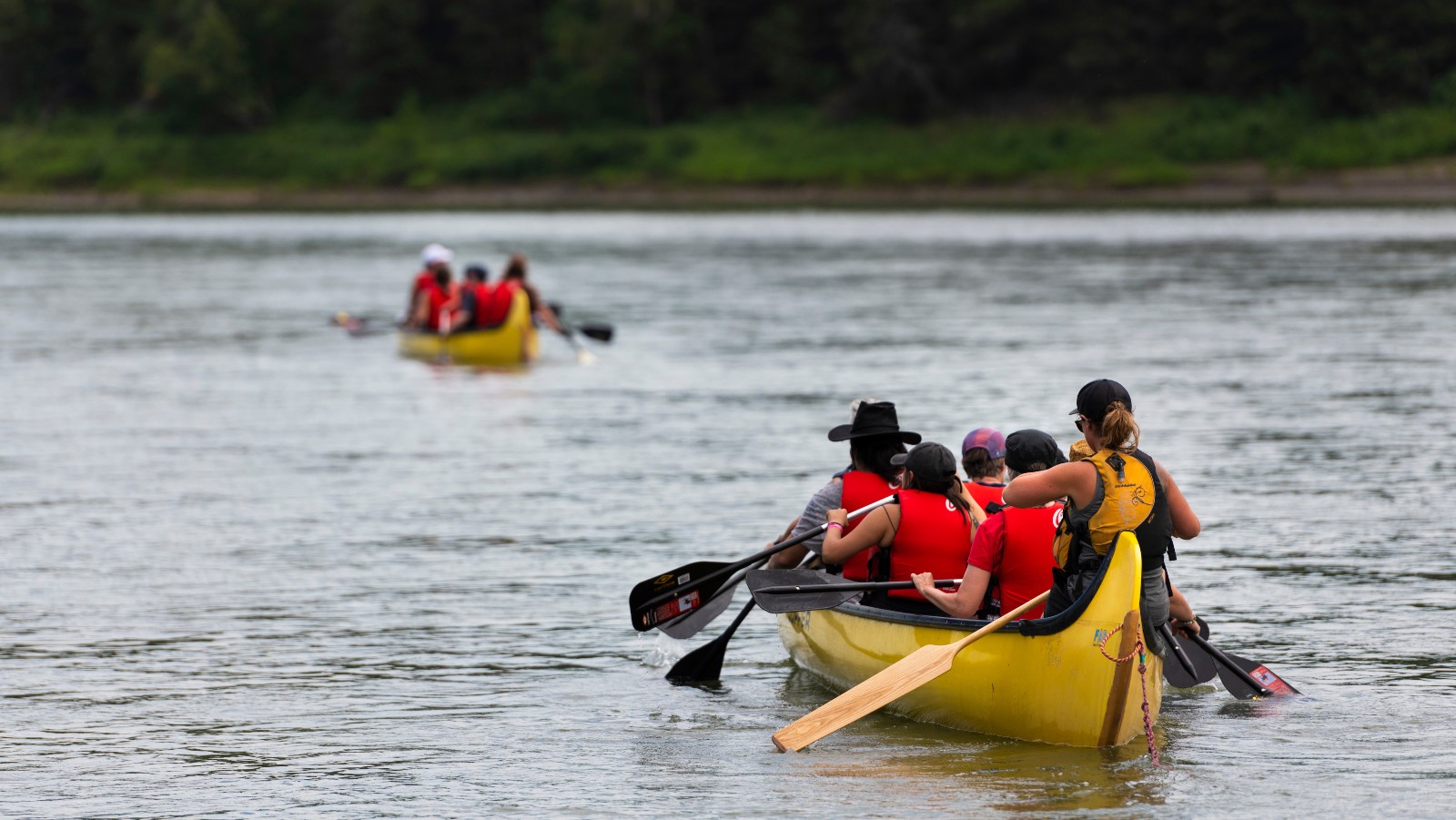 People in a canoe paddling