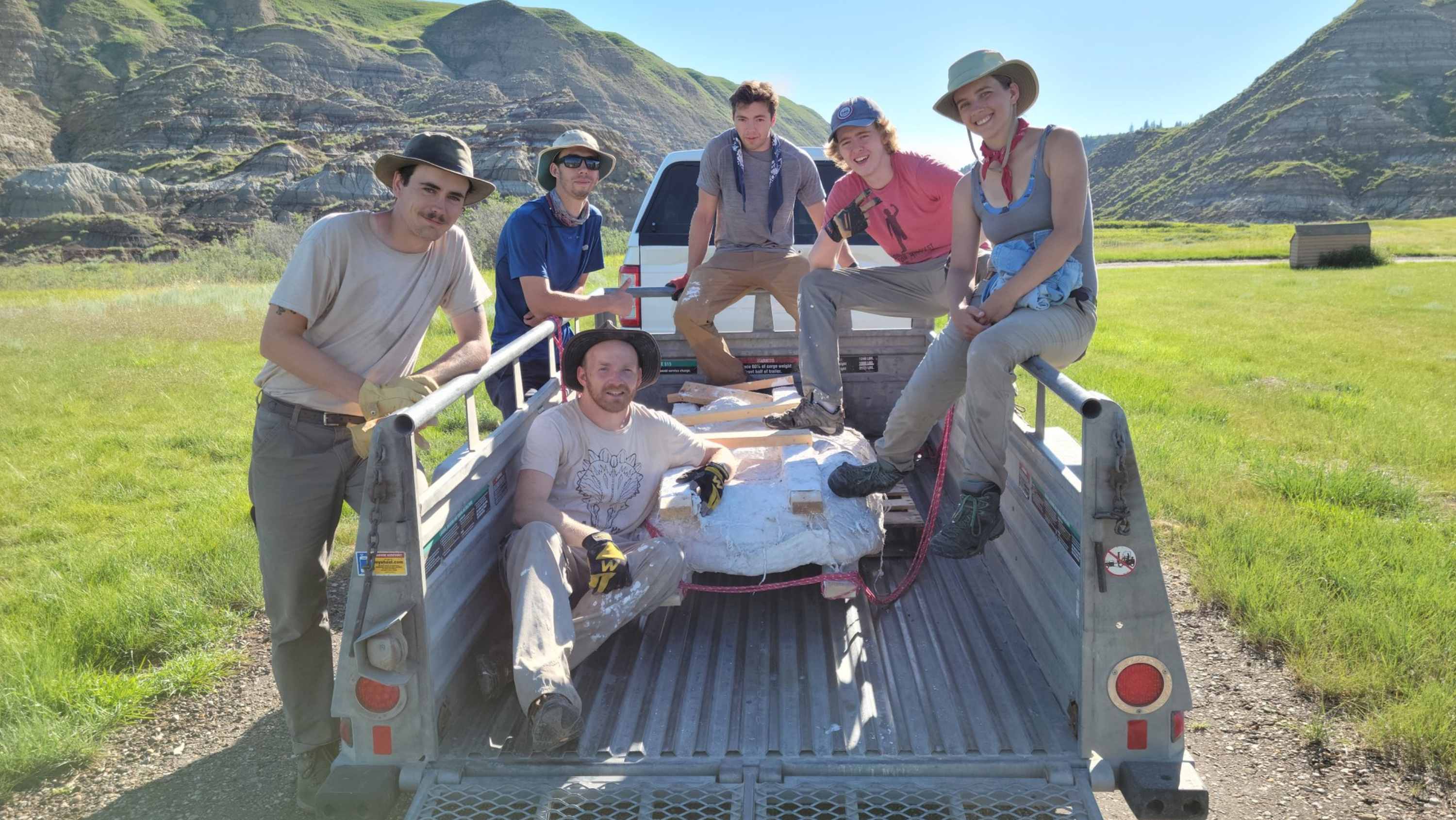  A team of U of A students at a dinosaur excavation site.