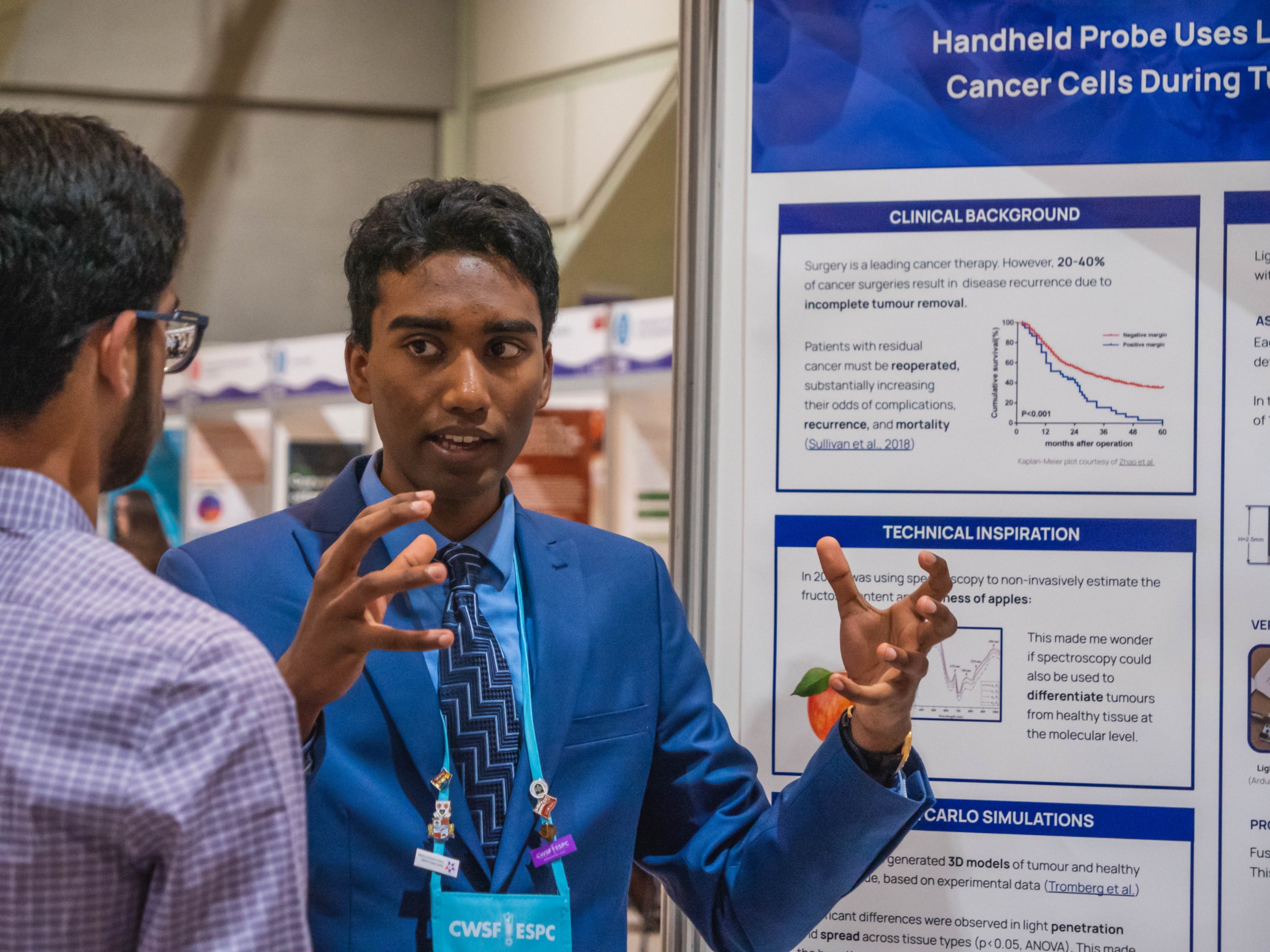 Grade 12 student Aaryan Harshith explains his LightIR project to develop a handheld device that could help detect and remove elusive cancer cells remaining after surgery to remove tumours. (Photo: Youth Science Canada)