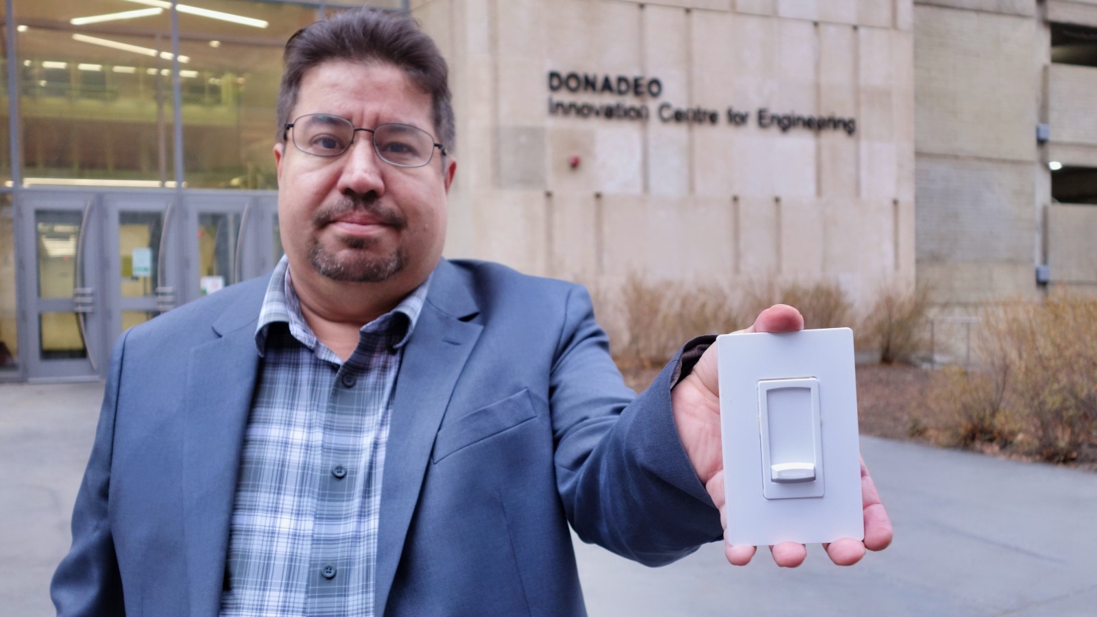 Engineering researcher Kambiz Moez is developing a wireless light switch that works without batteries, which could reduce the cost of wiring a house by up to 50 per cent. (Photo: Geoff McMaster)