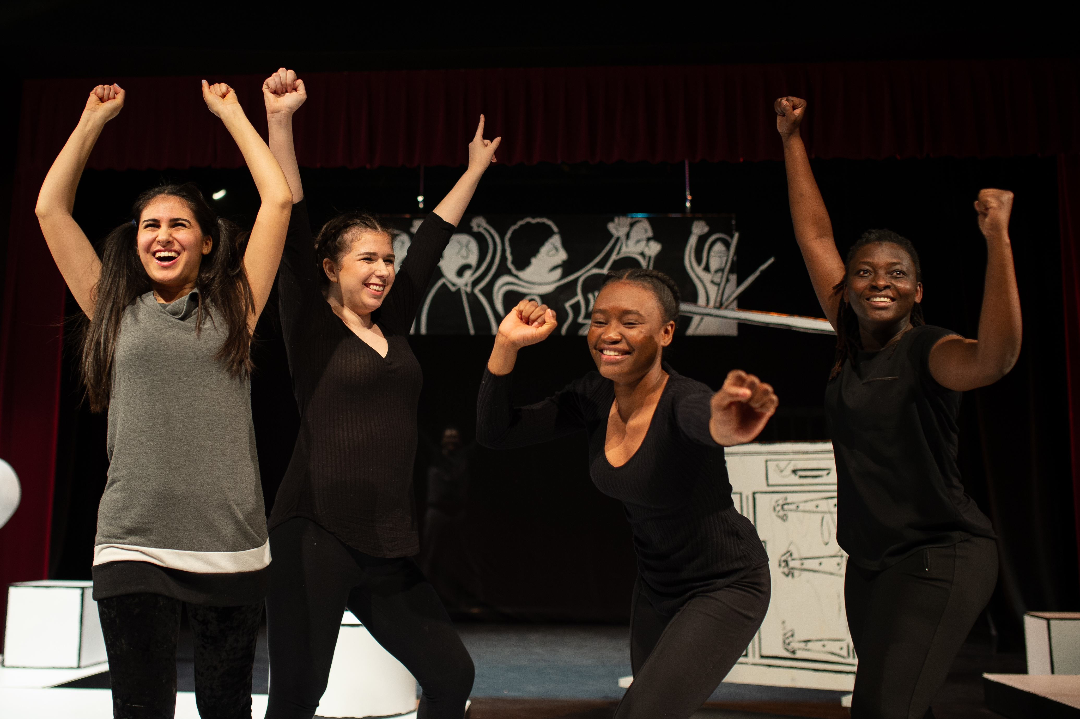 Students on stage acting in Persepolis.