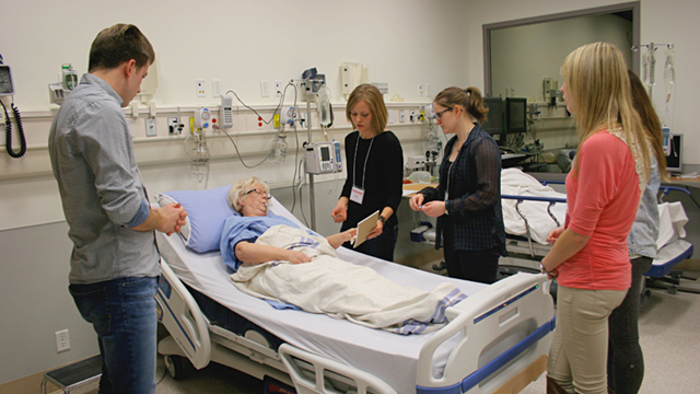 Students communicate with a simulated intubated patient