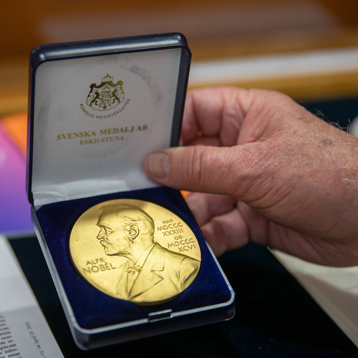 Michael Houghton holding his Nobel Prize