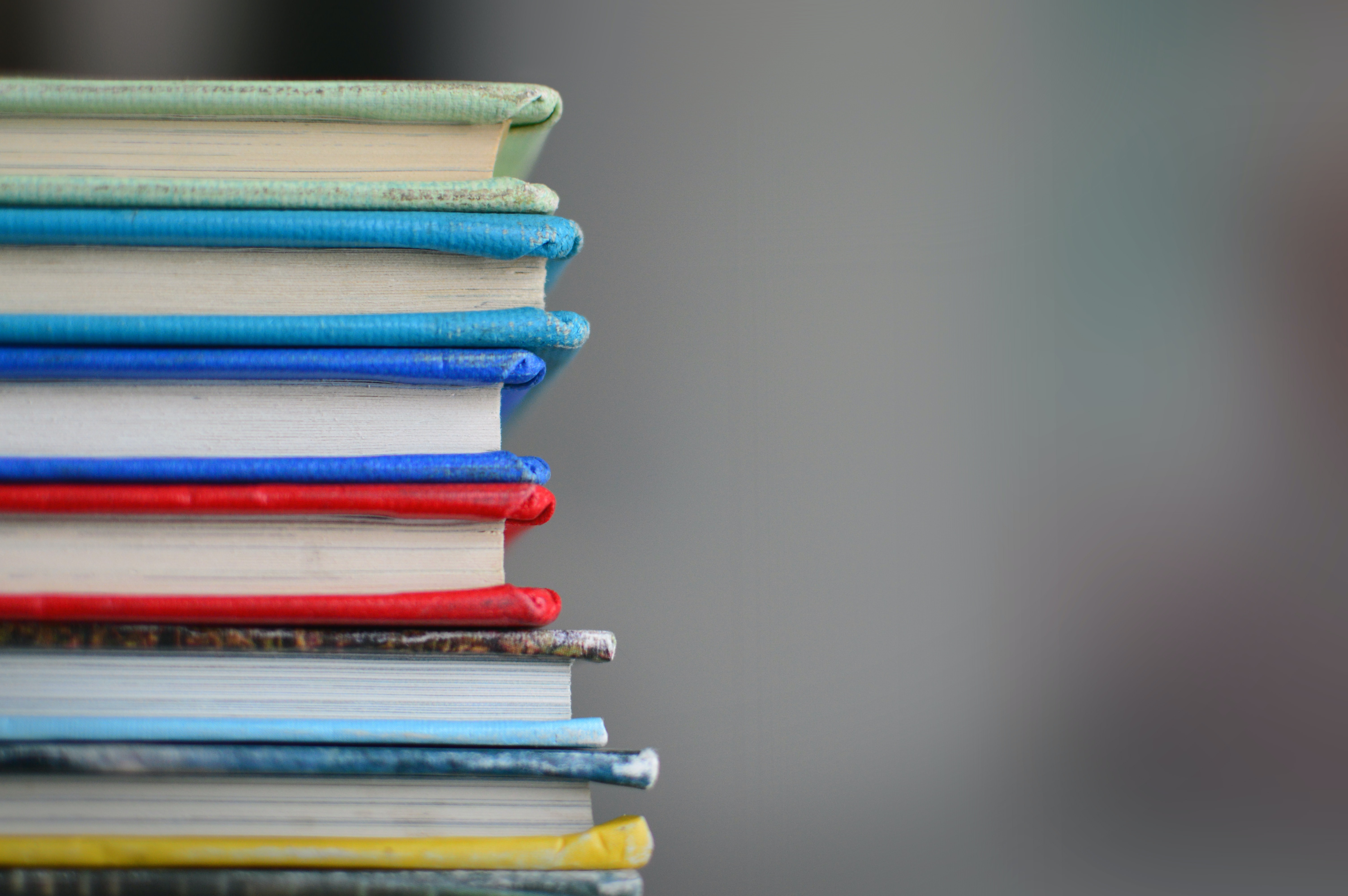 stack of colored books