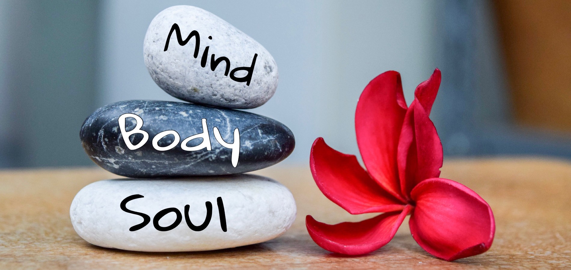Rocks that have the words Mind body soul