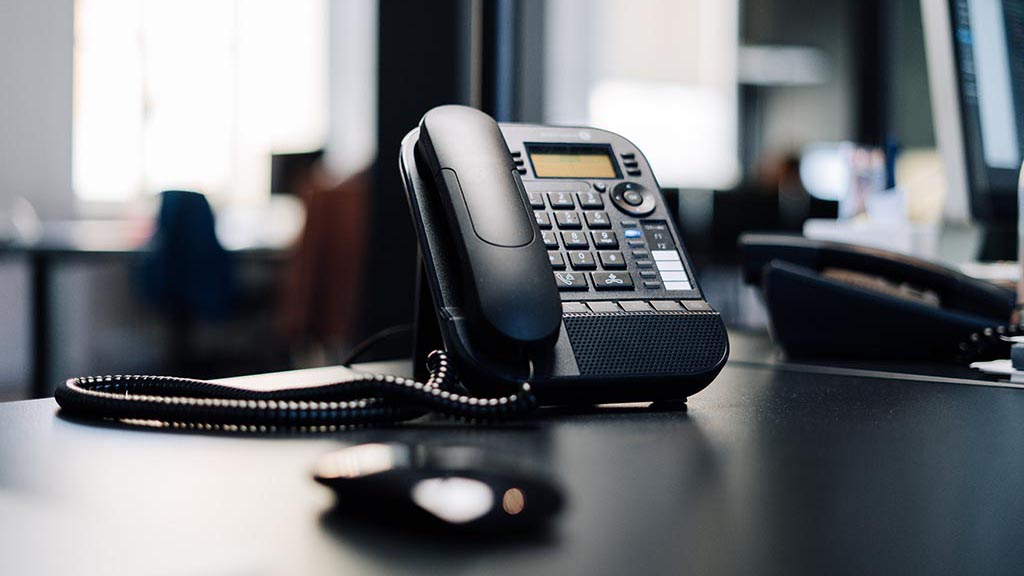 Landline phone on a desk
