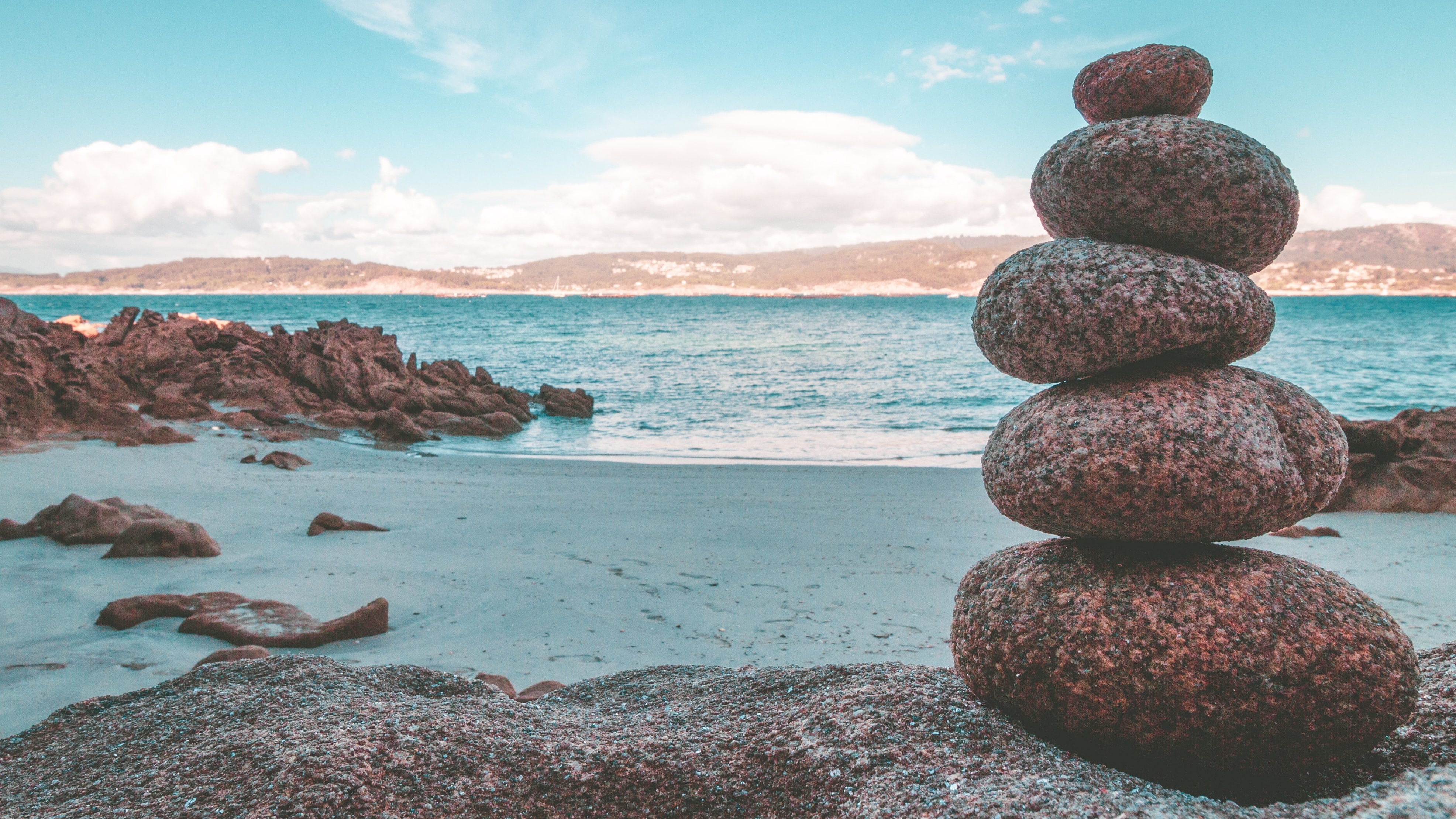 stacked rocks on beach
