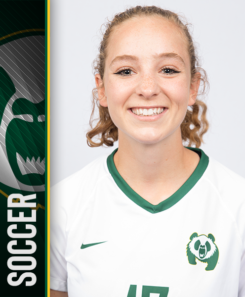 female with curly, light brown hair in pony tale and freckled face wearing soccer uniform smiles into camera. Side bar has image of the University of Alberta Pandas logo with the word soccer written underneath the logo
