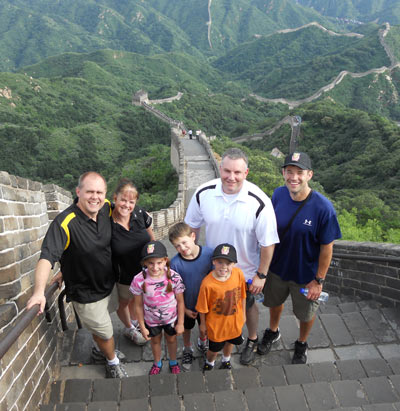 Lane and Kathleen Moore, Dan Mason, Kevin Masters and kids on the Great Wall of China