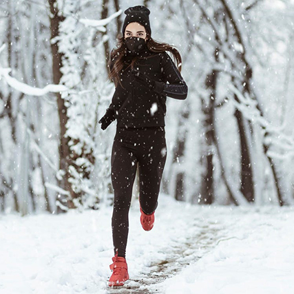 woman running in snow