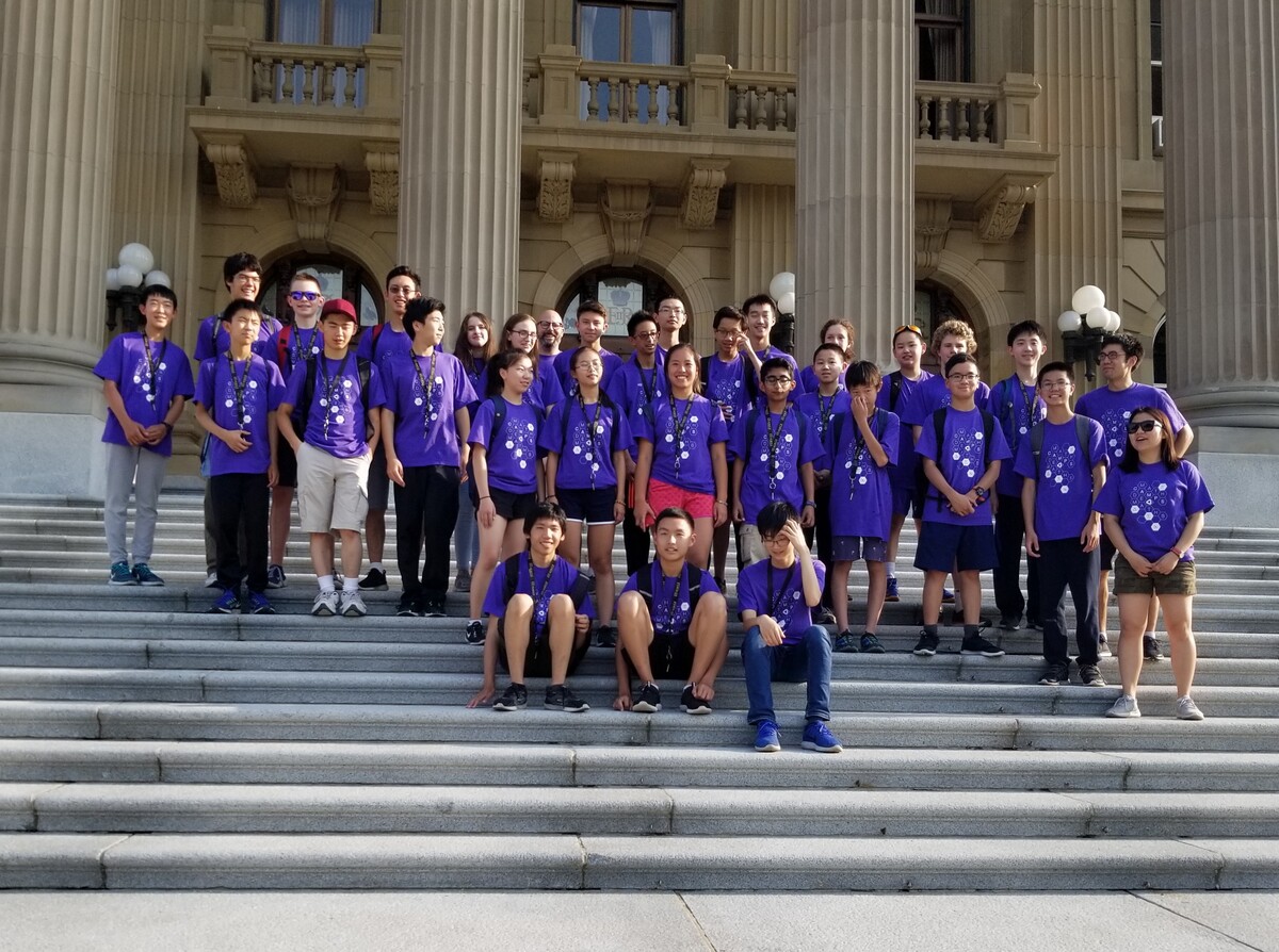 2018 CMS Camp participants standing in front of Alberta Legislature Building.