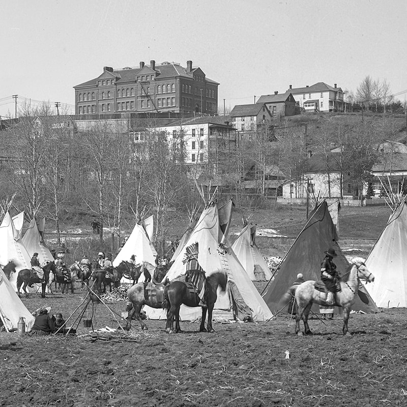 Black and white image of an encampment on Rossdale Flats in April 1919.