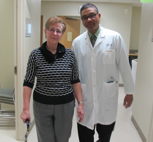 Dr. Rashiq with a patient who is recovering from a hip fracture. 