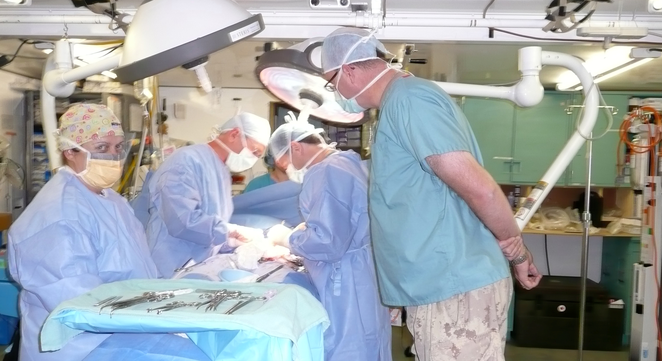 Miltary doctors in surgery