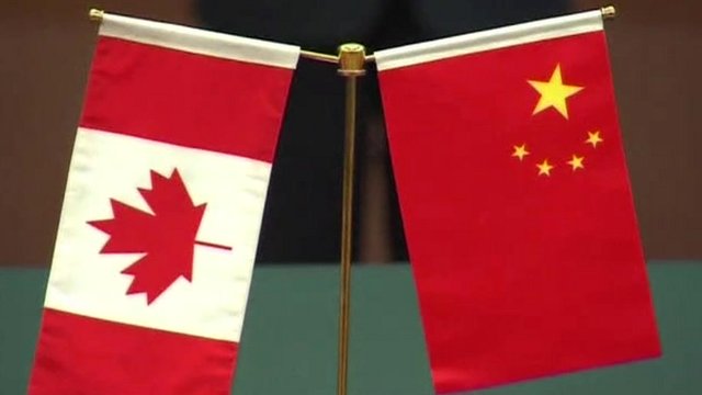 Canada flag and Chinese flag