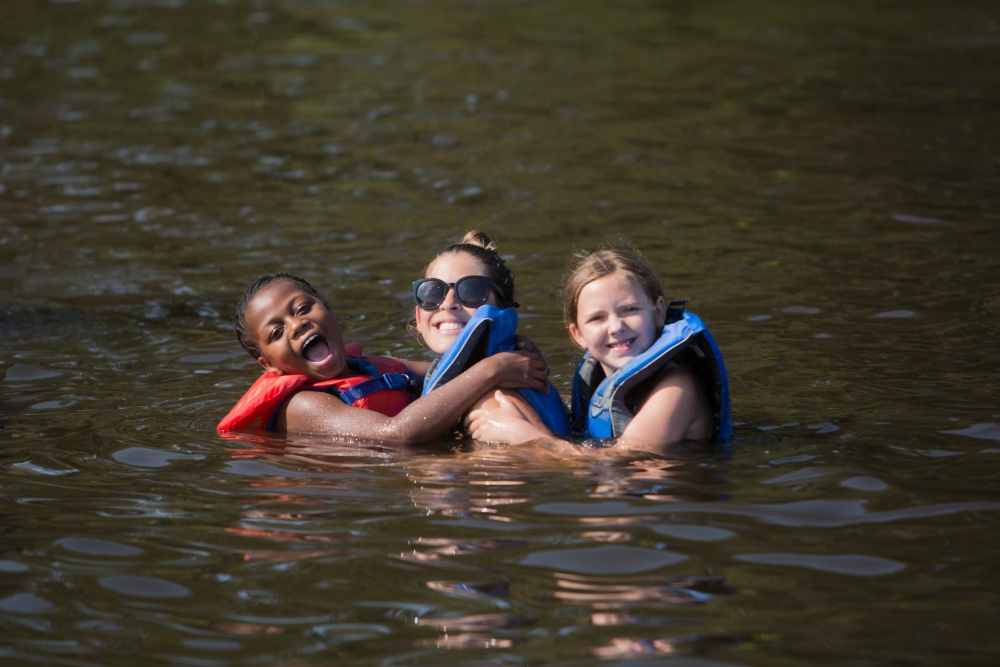 Children swimming at Heart Heroes Camp