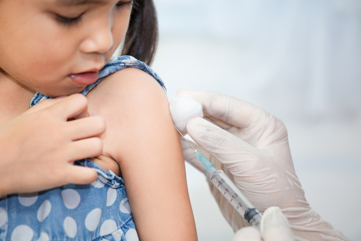 Child being immunized