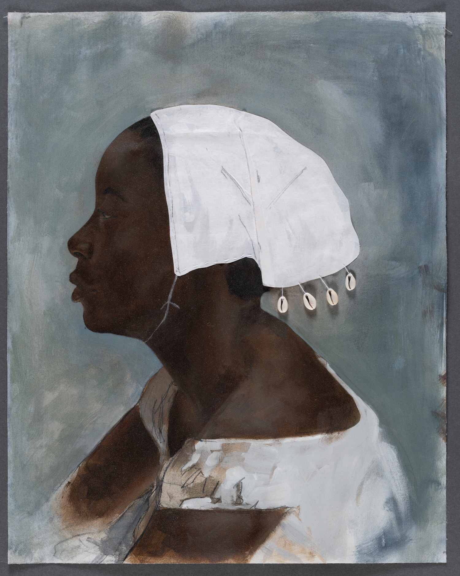 side profile of a young Black woman wearing a white headcover with a cowrie shell fringe. Both the headcover fabric and cowries are sewn on.
