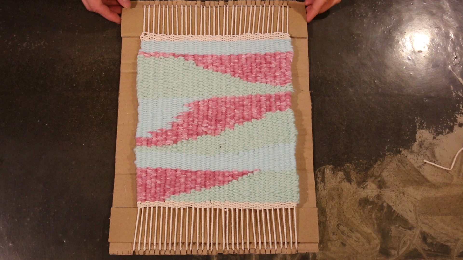woven tapestry on a home-made loom