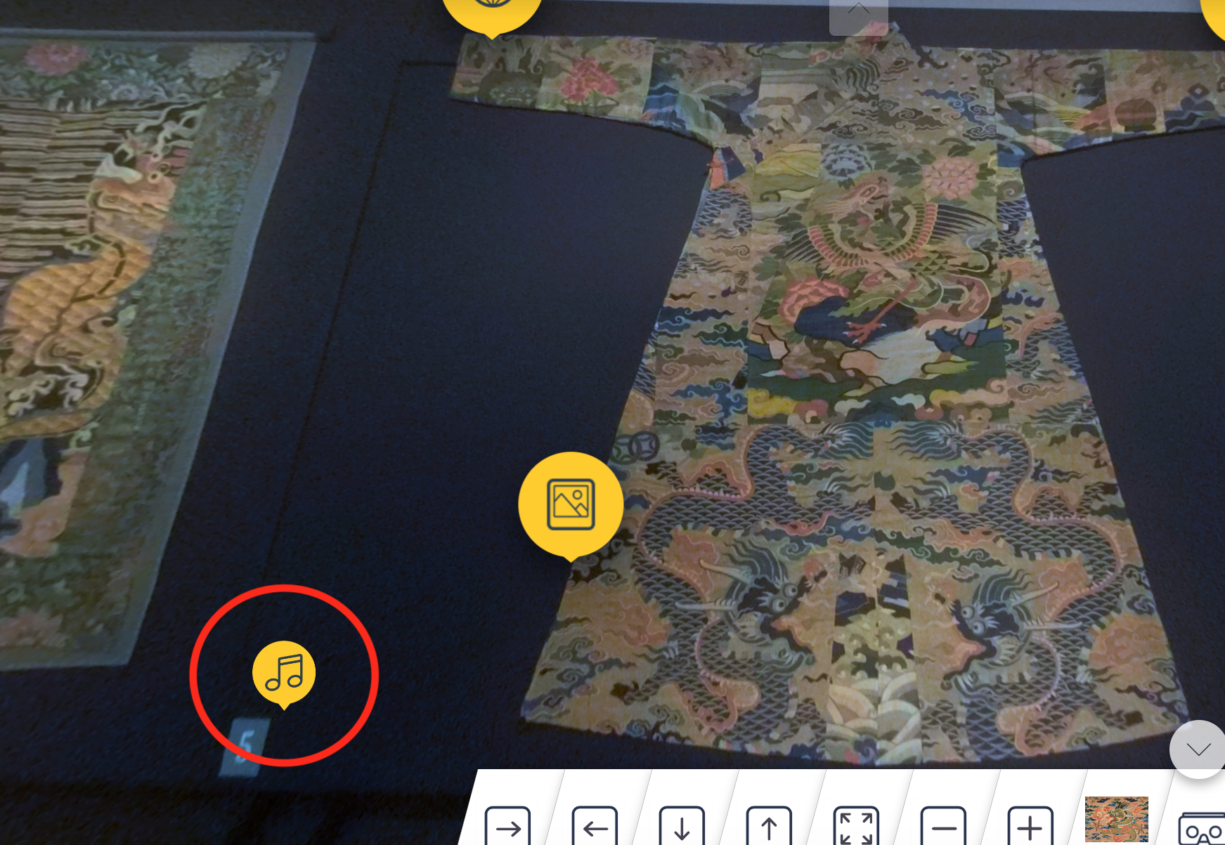 screen on VR tour with yellow icon with music notes circled to indicate this is where to click for the audio tour.
