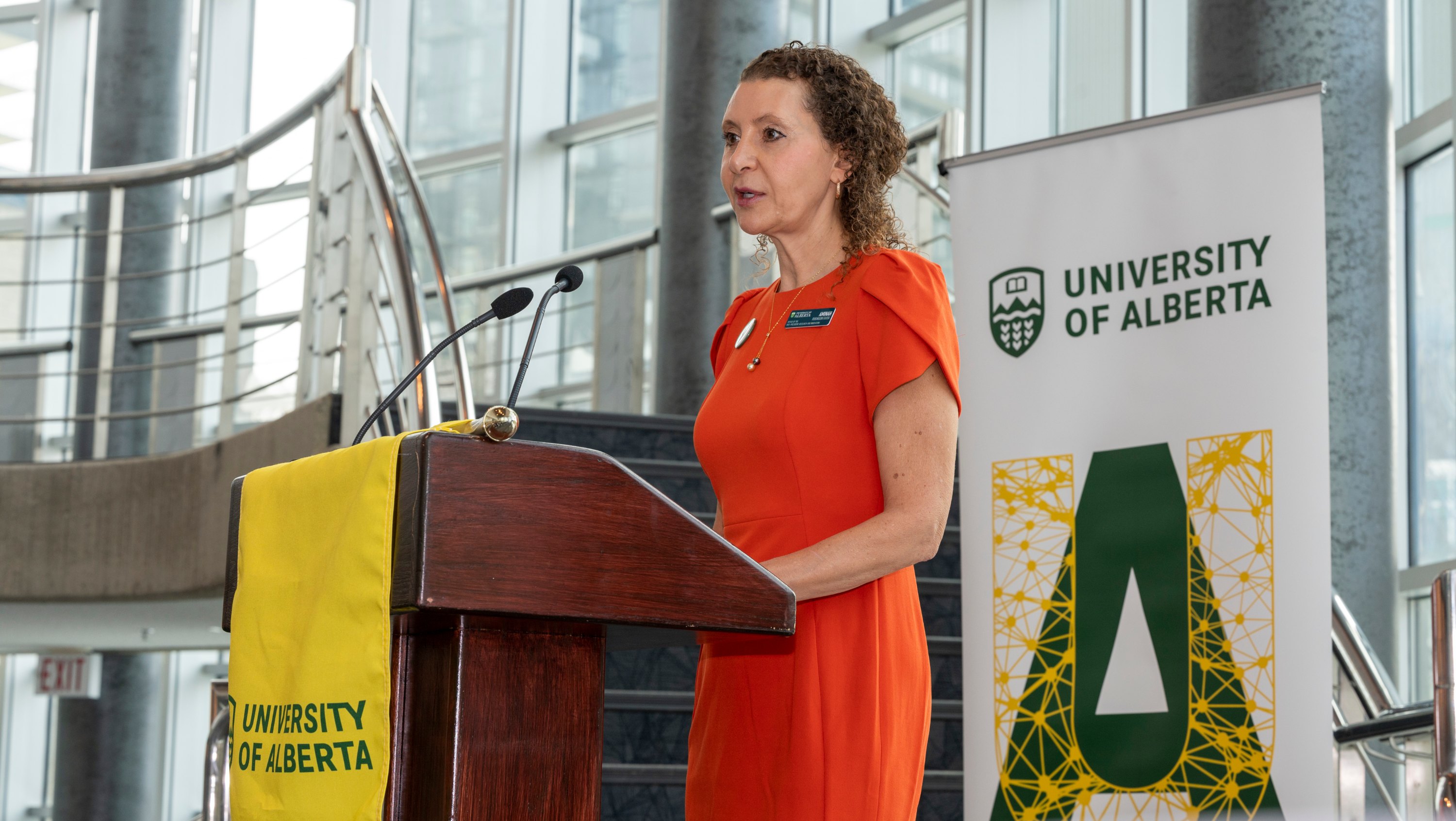 Aminah Robinson Fayek, U of A vice-president (research and innovation) speaks at a podium during the launch of the university's Strategic Plan for Research and Innovation.