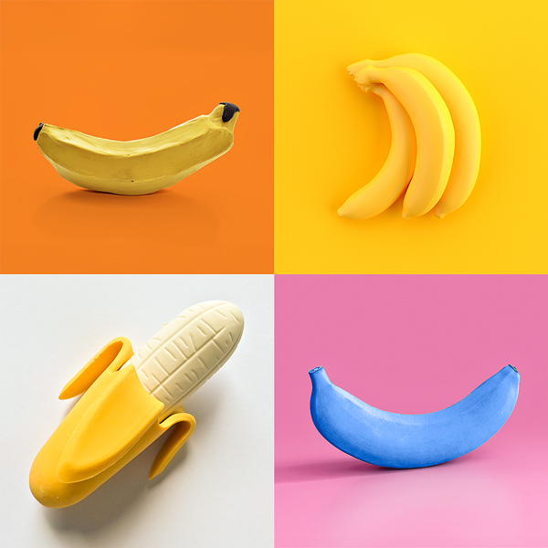 Colourful grid of different coloured bananas