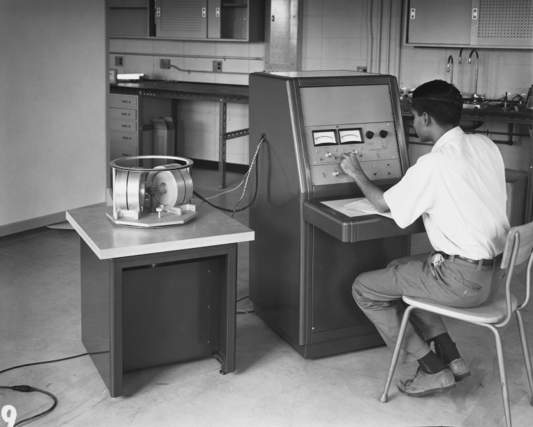 G.S. Murthy operating the spinner magnetometer in the Palaeomagnetic Lab in the old Physics Building (photo 2). Murthy may have been the first Ph.D out of this Lab. He then moved to Memorial University of Newfoundland (MUN). Photo Courtesy: Department of Physics, University of Alberta.