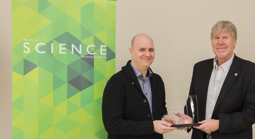 Associate professor Darren Grant receives the Faculty of Science Research Award from Research Advisor Fred West, Research Advisor with the Faculty of Science, during the Celebration of Excellence on May 2, 2016.