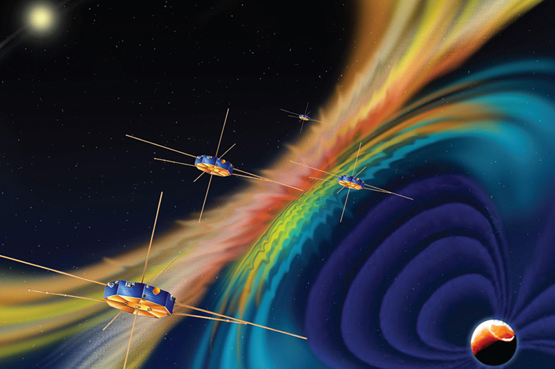 This artist rendition of the Magnetospheric Multiscale Mission (MMS) spacecraft shows the magnetic topology in the background. The solar magnetic field lines (orange-reddish colour) makes contact with the Earth's magnetic field (bluish colour). Where they meet, there is a "magnetic explosion.” Waves and energized plasma then emanate from the magnetic reconnection zone. Image: NASA.