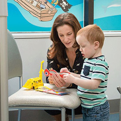 Catherine Morgan with a pediatric patient