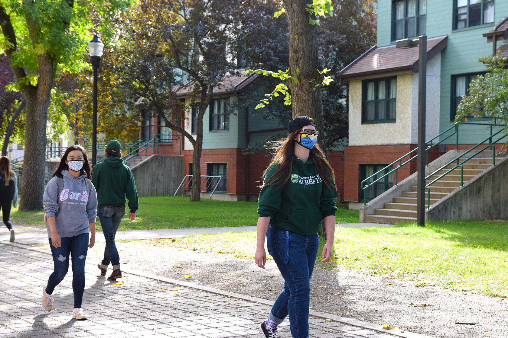 UAlberta residents walking outside wearing masks