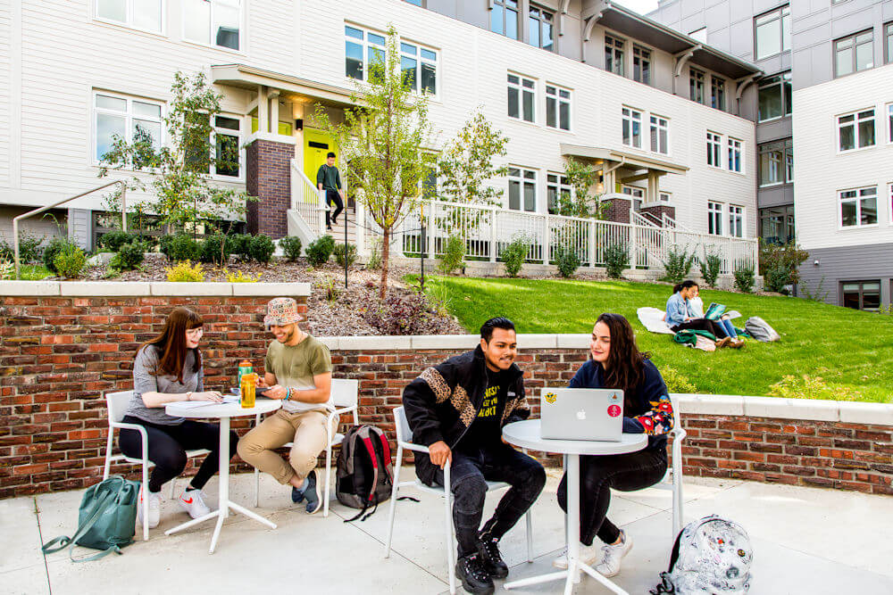 UAlberta student residents studying on an outdoor patio