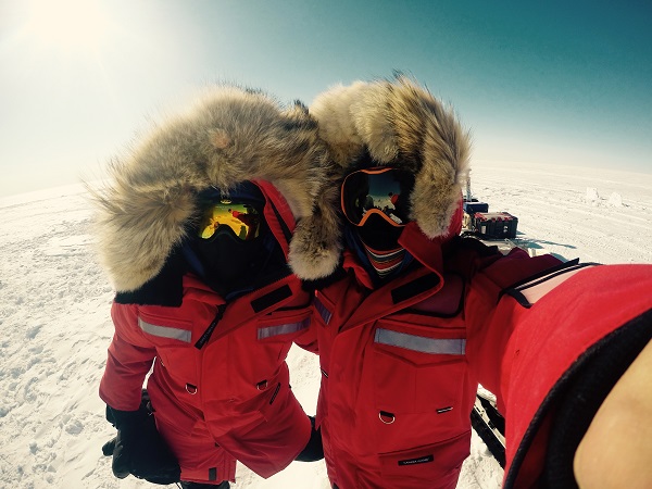 Ali Criscitiello and Anja Rutishauser take a selfie in their winter gear on the Devon Ice Cap.