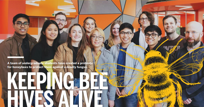 Group photo of students involved in creating probiotics for honeybees, text overlay reads, "Keeping bee hives alive."