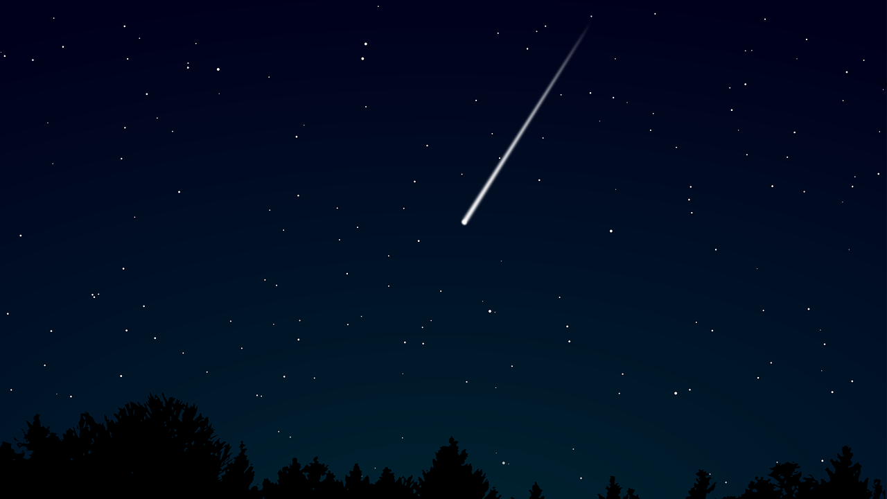 a meteor streaking through a night sky