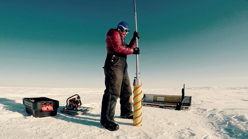 Ali Criscitiello drilling an ice core sample on the Agassiz Ice Cap in Nunavut, Canada.