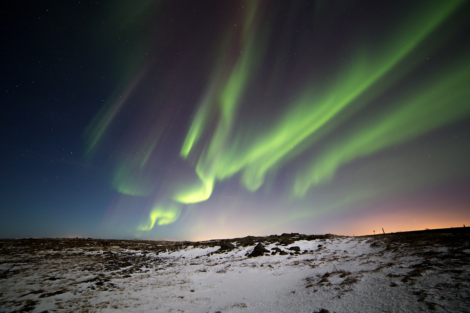 The Northern Lights are pictured here over Iceland. Photo credit: David Phan. CC BY 2.0.