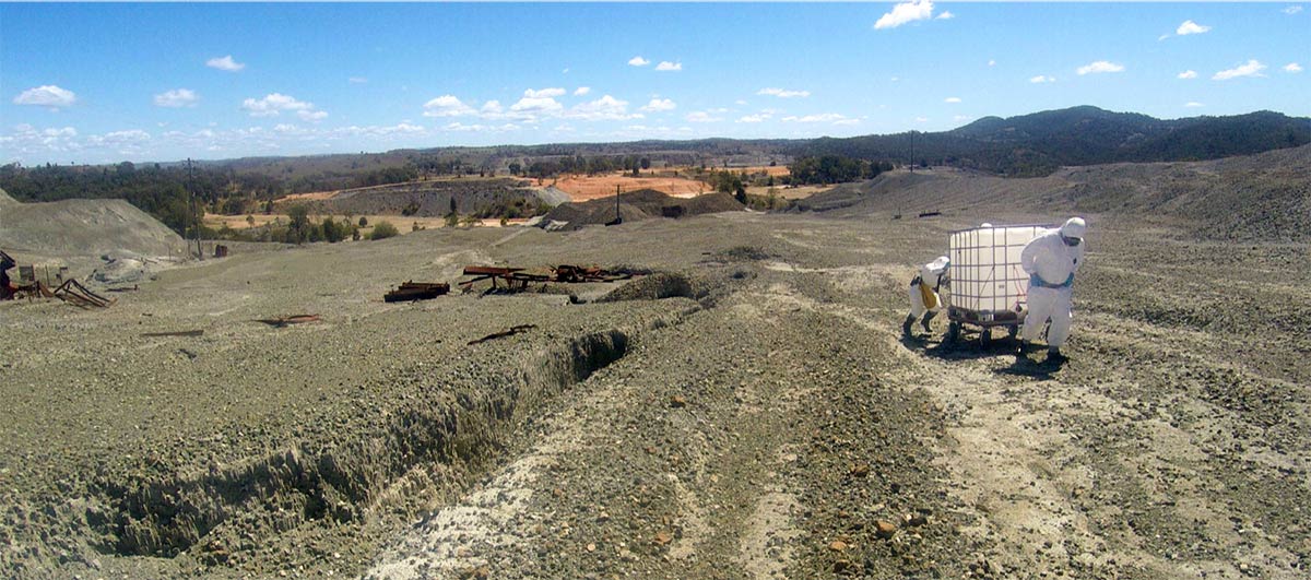 Sasha Wilson and her team haul water up a mineral waste pile outside Brisbane, Australia for on-site testing.