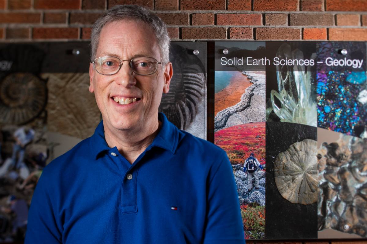 March Instructor of the Month Fred Clark, pictured in the Earth Sciences Building.