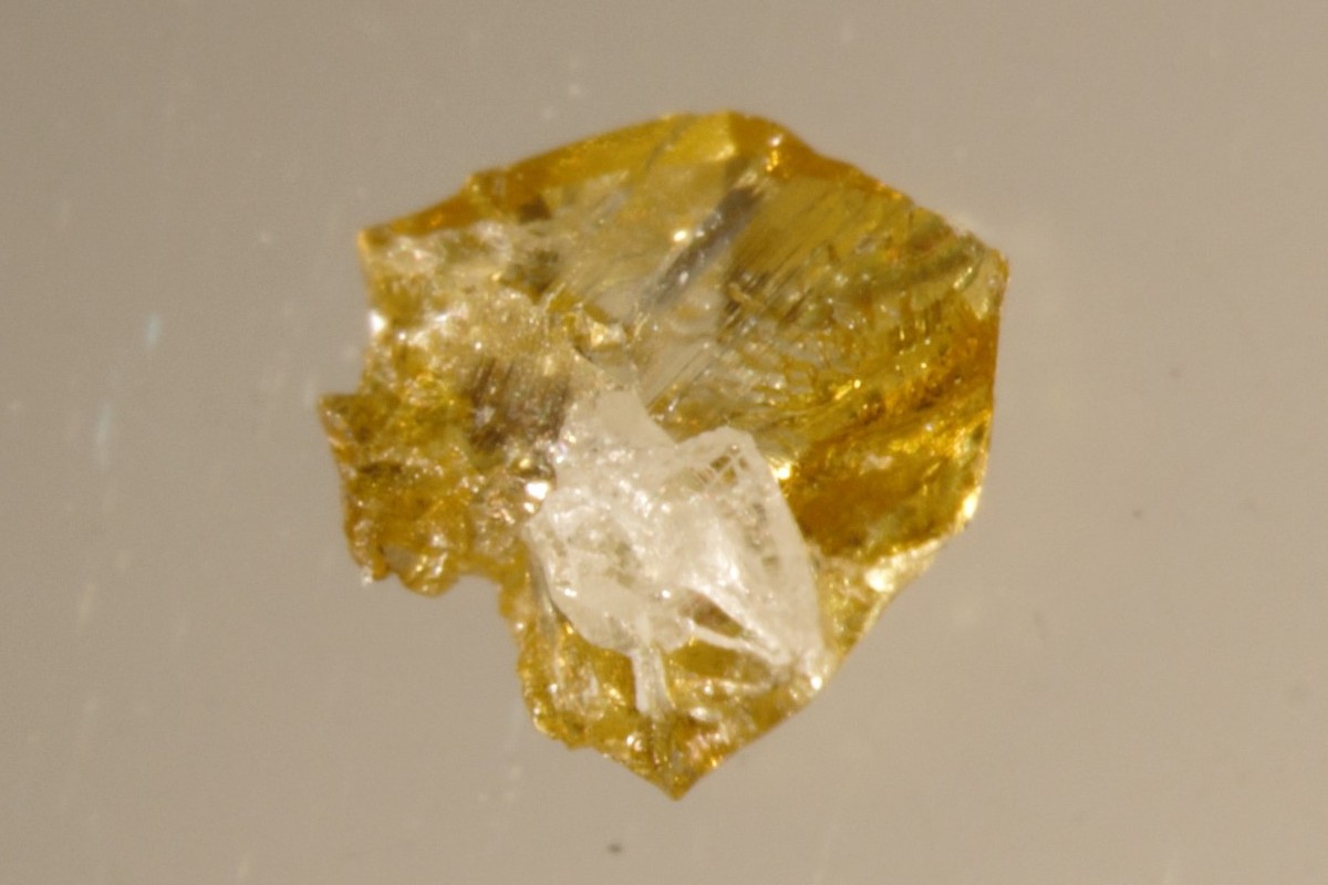 Yellow diamonds, some with colourless cores like the one pictured here, are of interest to the gemstone industry.
