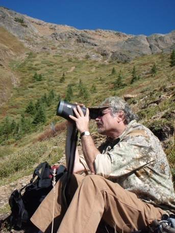 Population ecologist and professor in the Department of Biological Sciences Mark Boyce is recipient of a 2021 J. Gordin Kaplan Award for Excellence in Research. Here, Boyce is pictured doing field work in the Willmore Wilderness Park area.