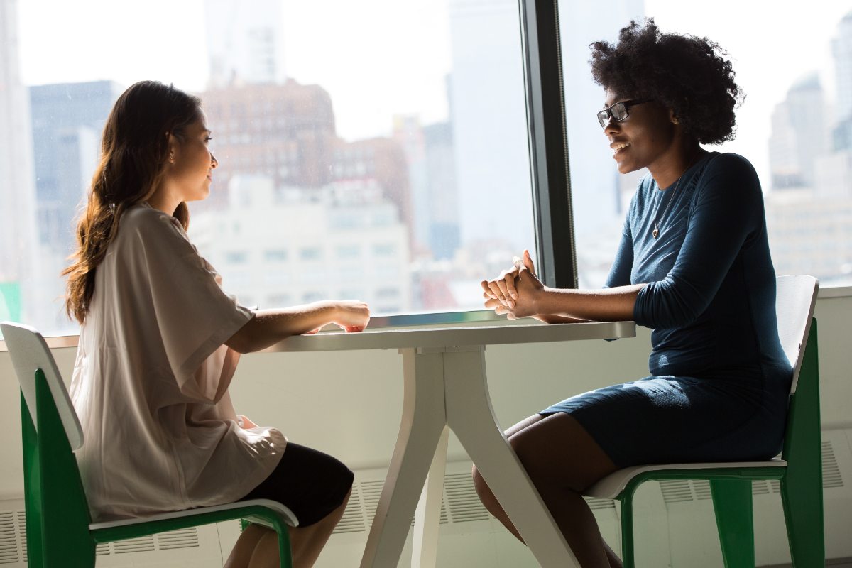 Two people speak at a job interview. In this issue of Dear Maddi, Becky Ponting shares some tips for managing anxiety when meeting new people.