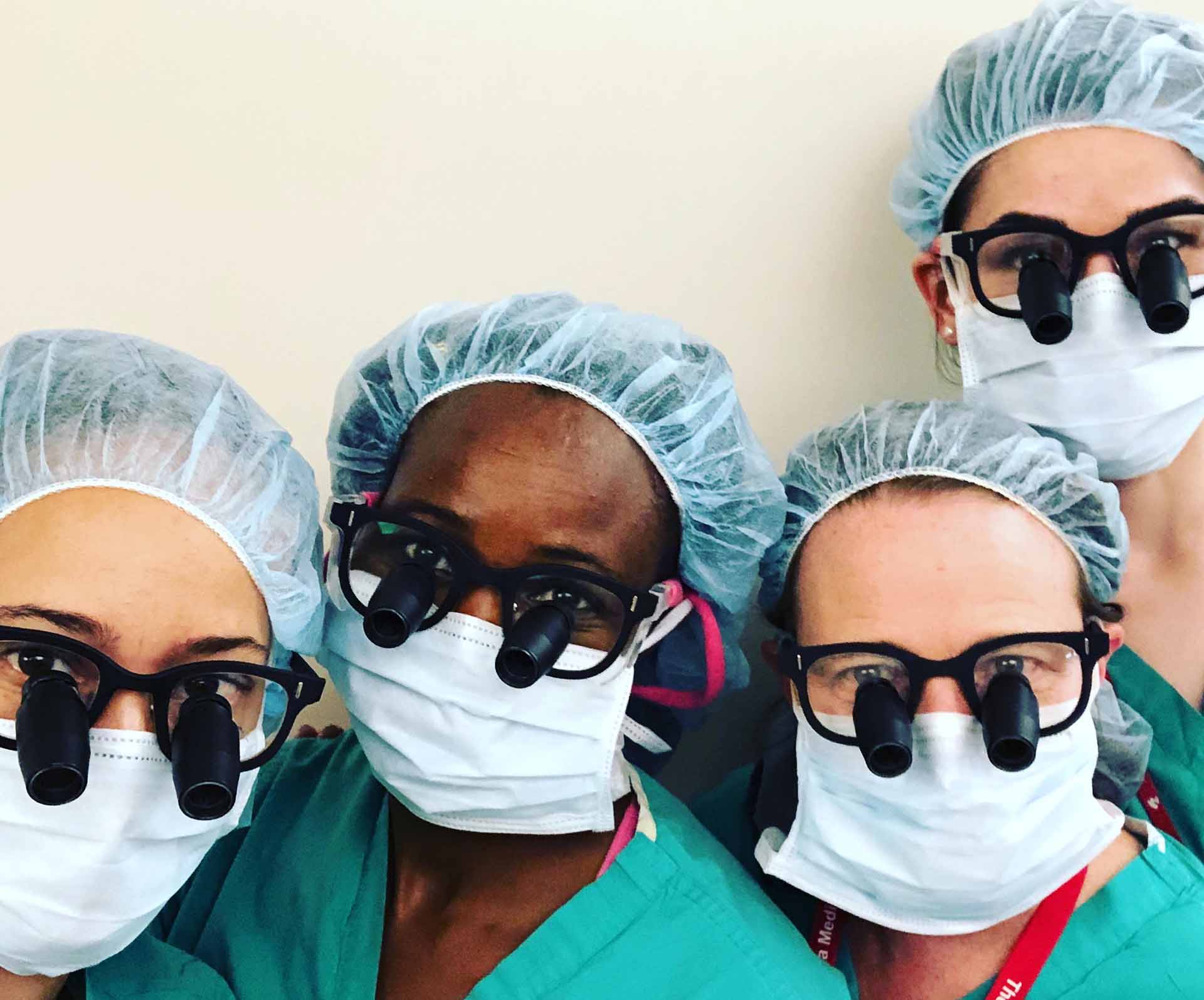 Four Transplant surgeons posing for a picture