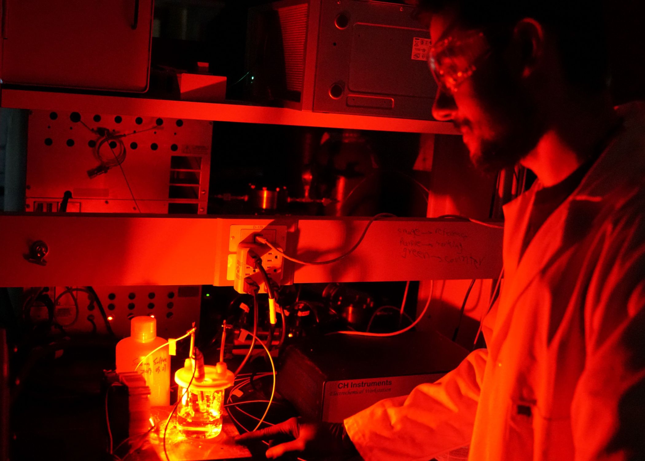 student working on research in lab as part of the Department of Electrical and Computer Engineering