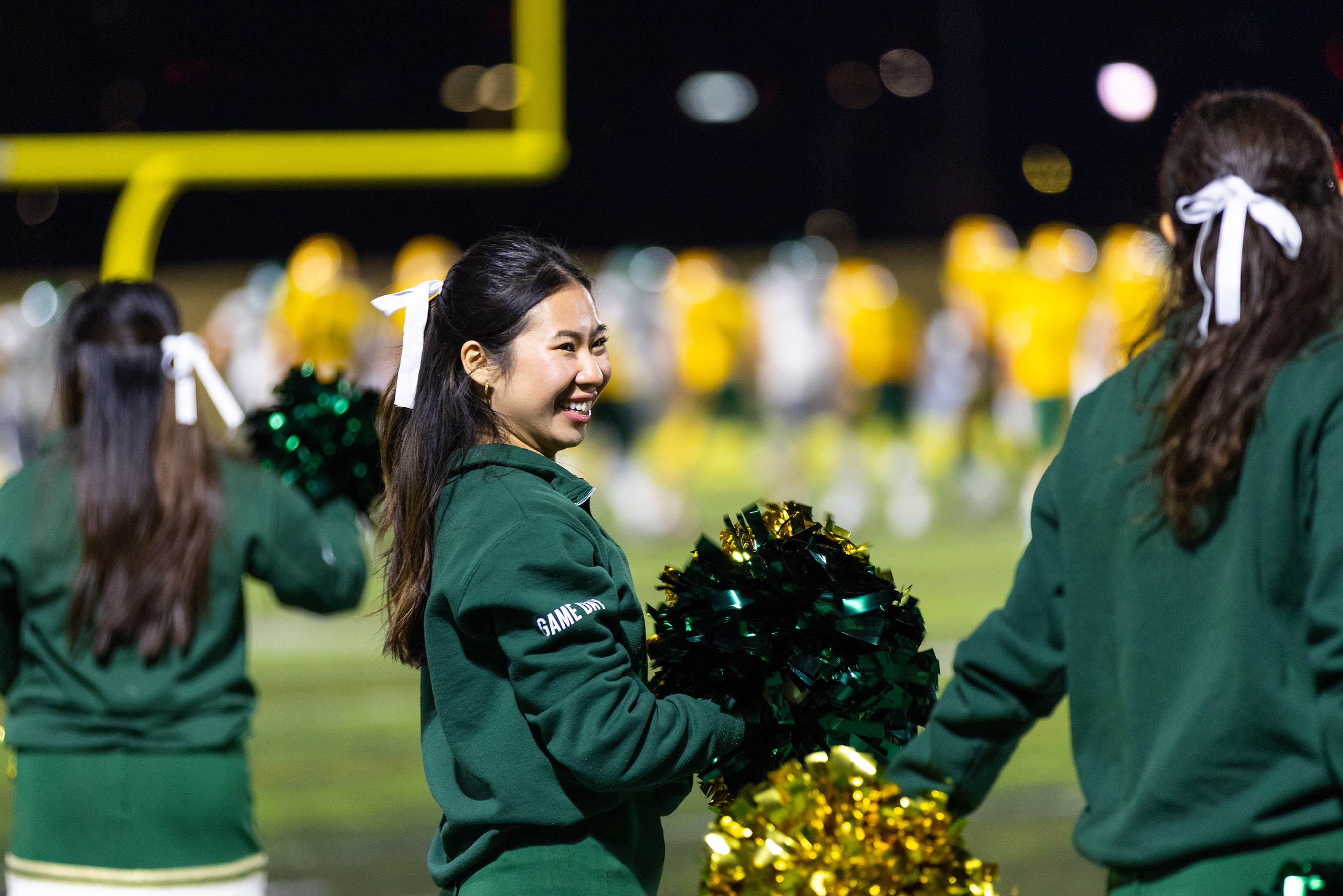 The University of Alberta Cheer team at the Golden Bears football game