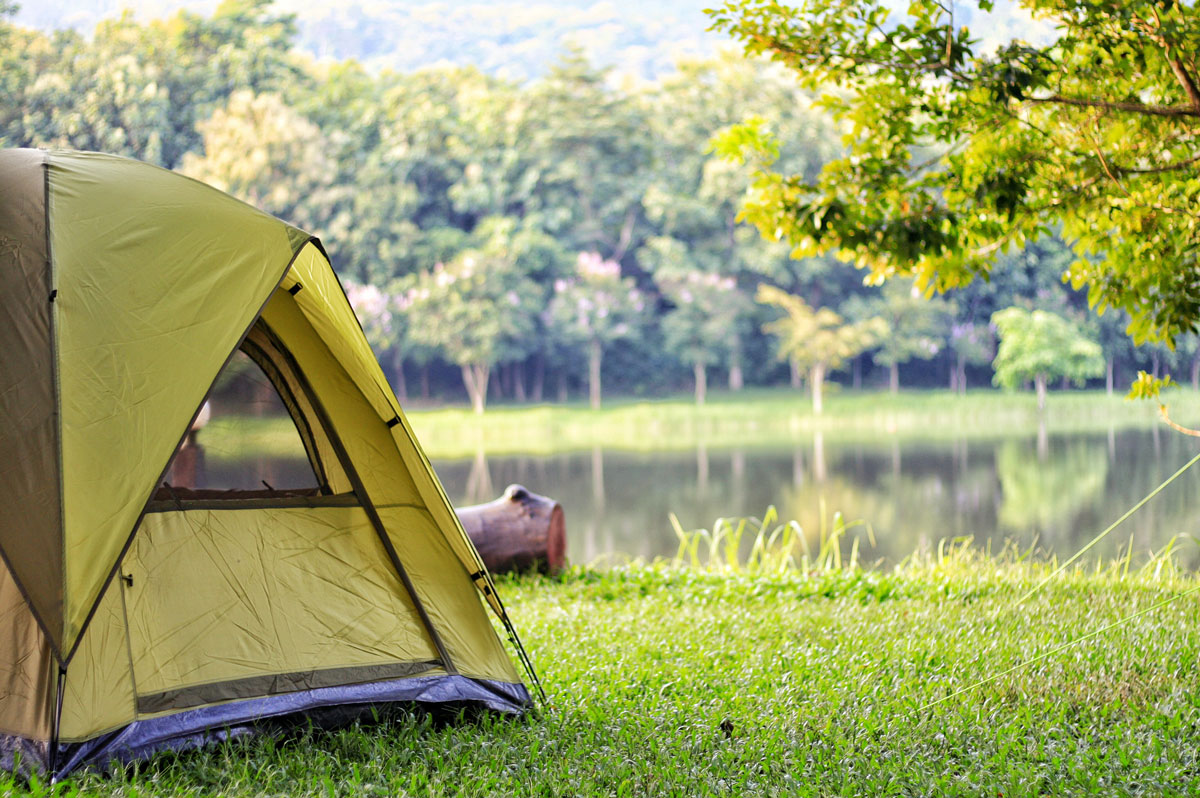 Tent by the side of a lake